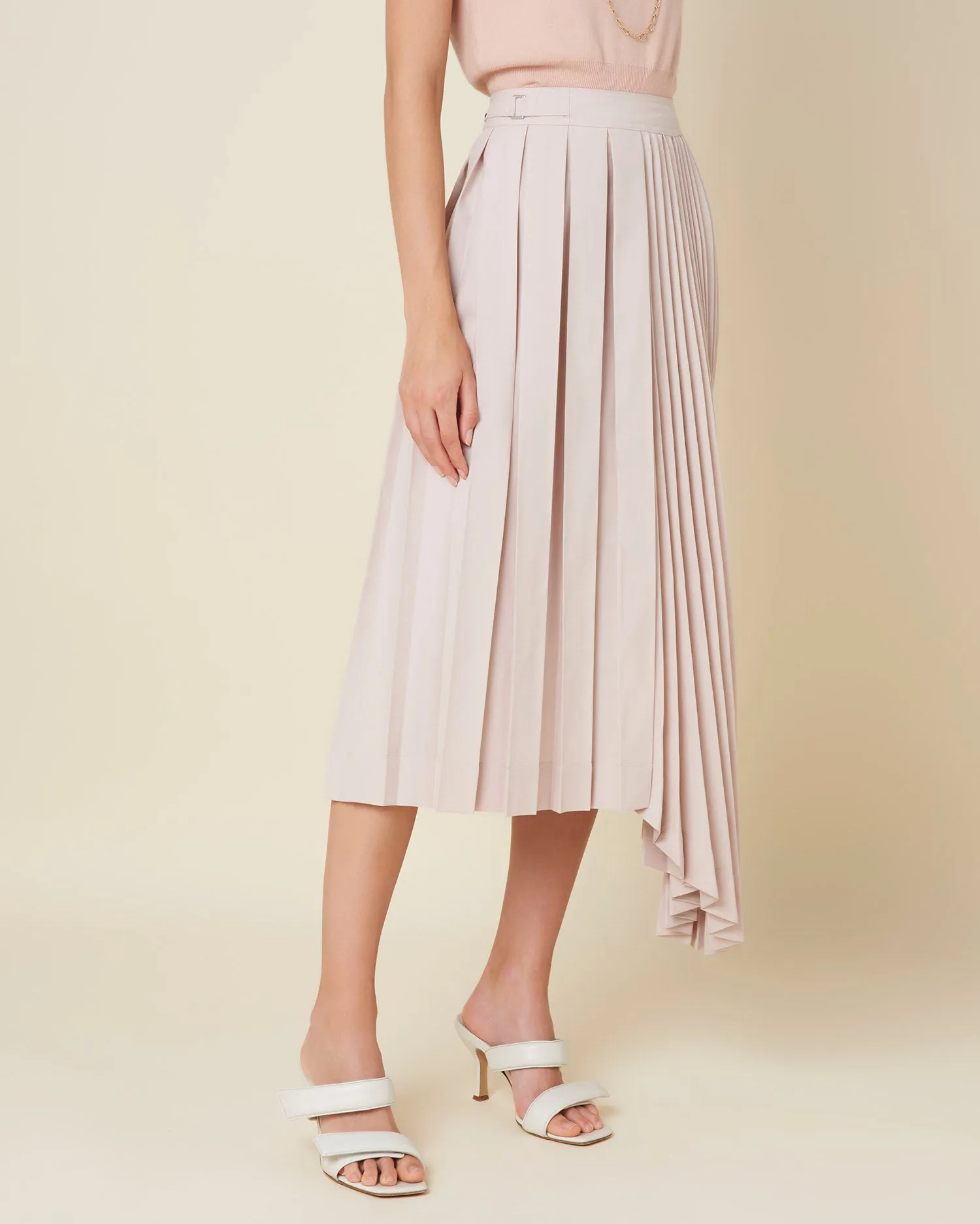 Asymmetric pleated skirt