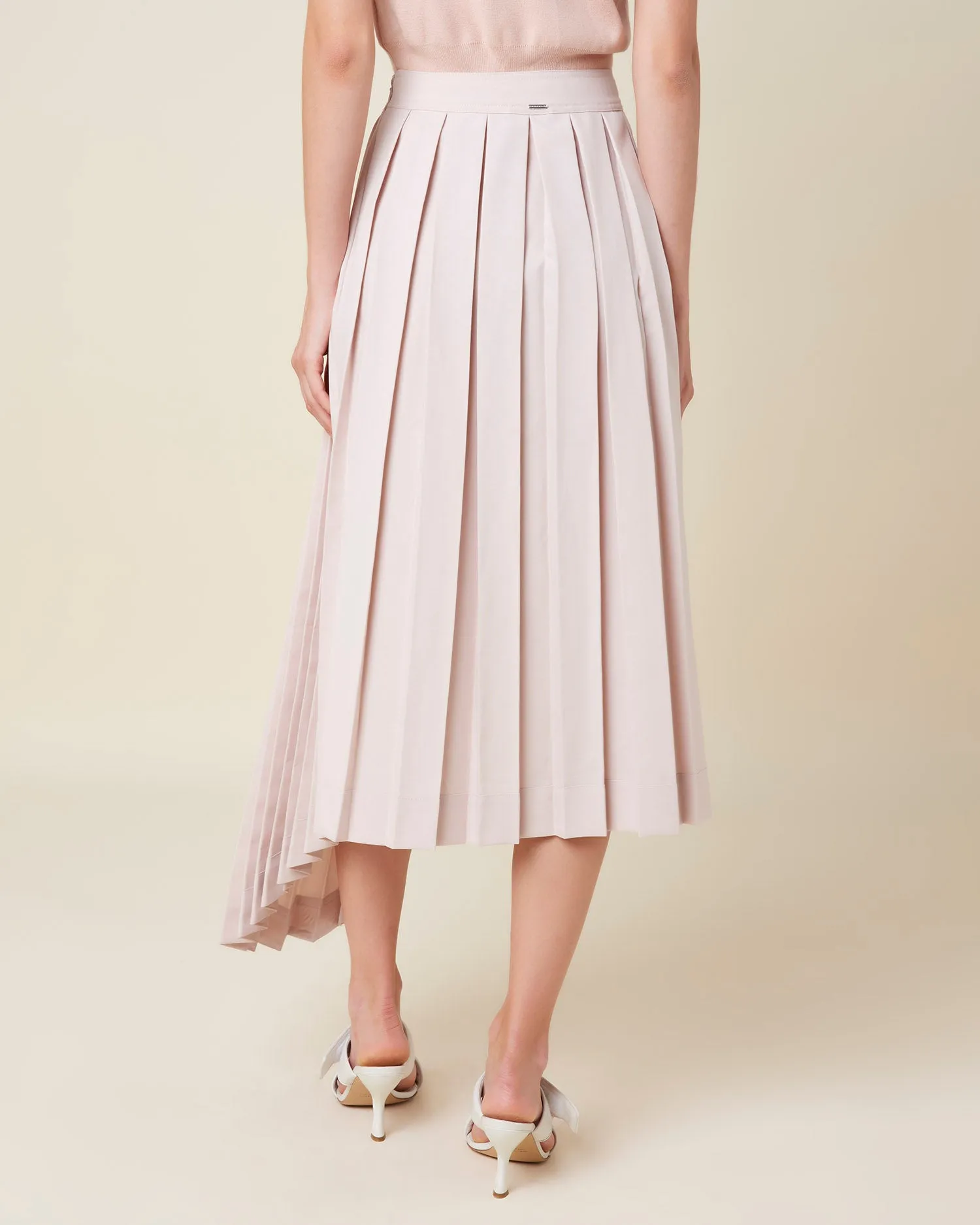 Asymmetric pleated skirt